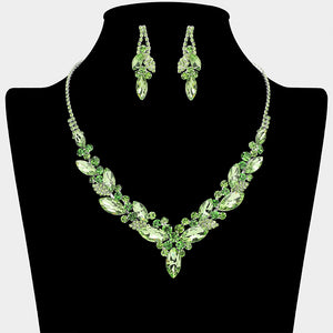Light green and green marquise crystal cluster necklace set with matching earrings on silver backing for prom and evening wear on a black mannequin bust on a white background