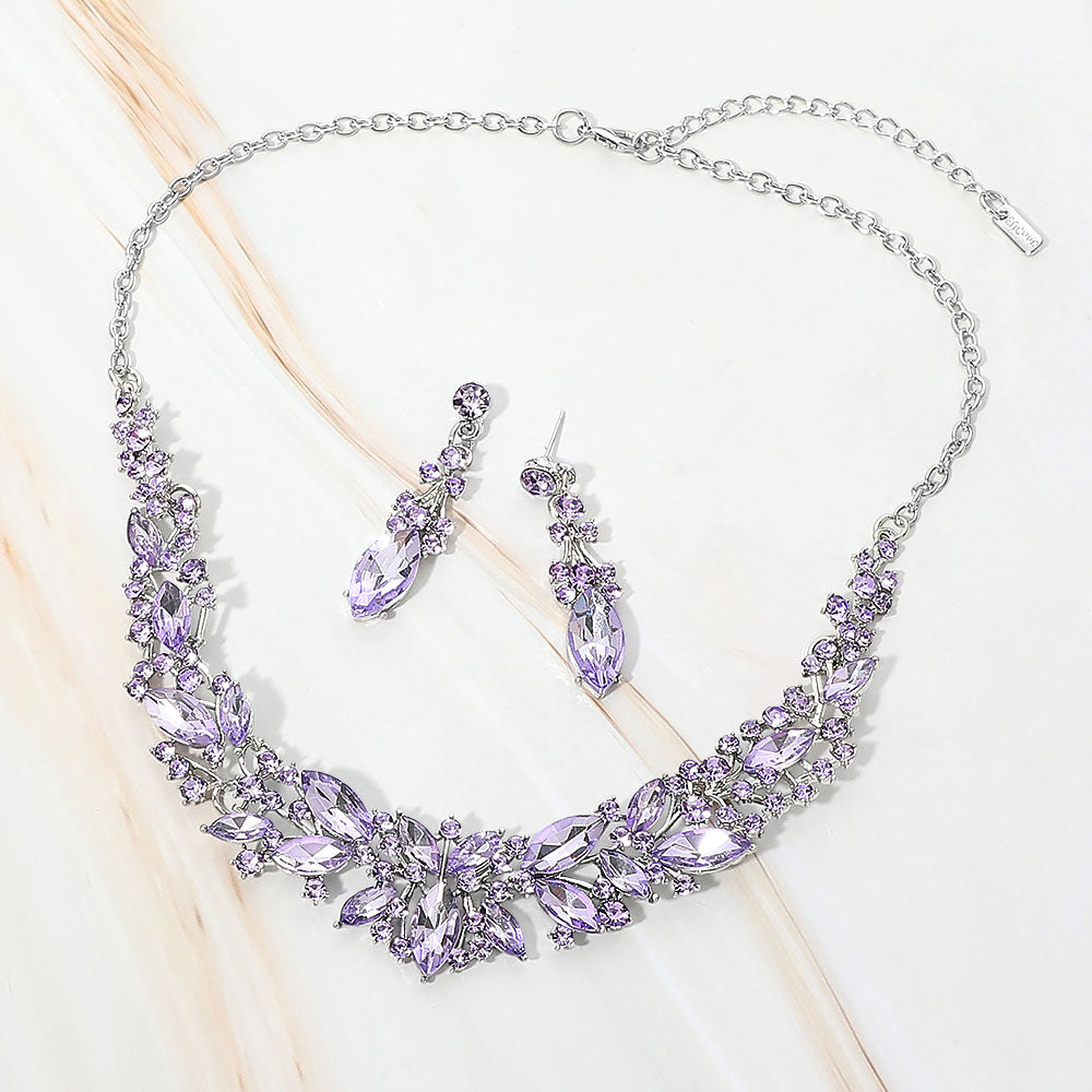 Violet Purple marquise stone cluster prom and evening necklace set on silver on white marble background