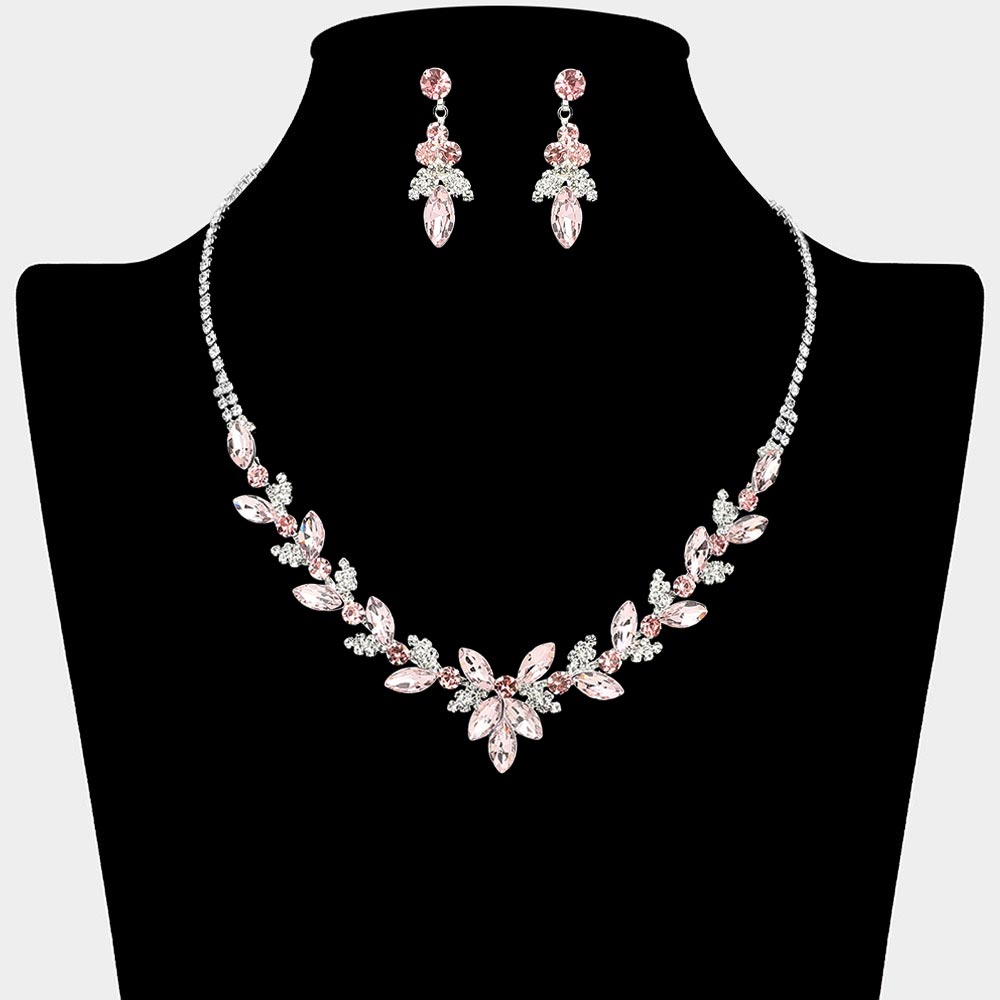Light pink marquise floral rhinestone necklace set on silver displayed on black bust background