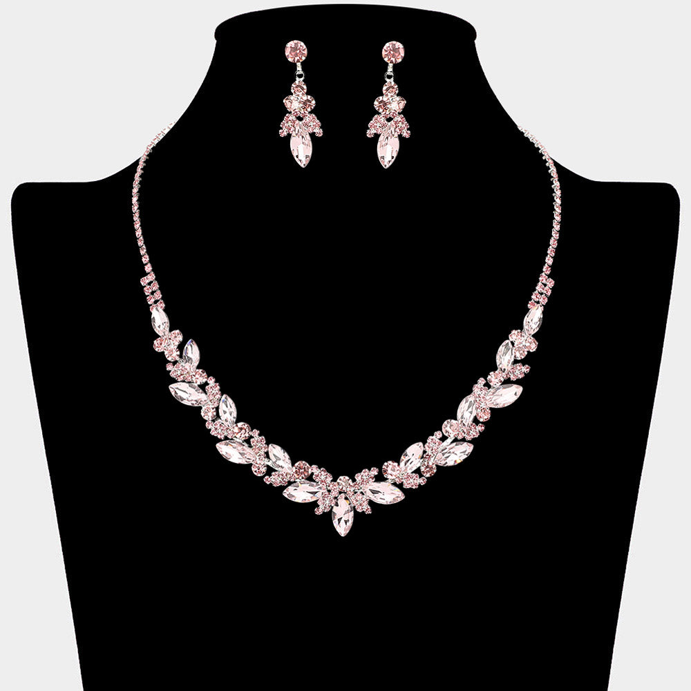 Light pink marquise leaf rhinestone necklace set on silver displayed on black bust background