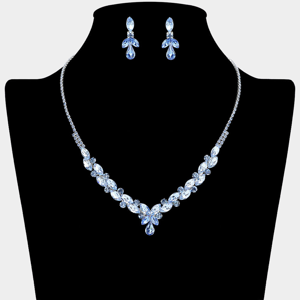 Light Sapphire marquise teardrop rhinestone cluster necklace set with matching earrings, all silver backed for prom and formal wear on a black mannequin bust. 