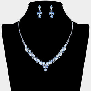 Light Sapphire marquise teardrop rhinestone cluster necklace set with matching earrings, all silver backed for prom and formal wear on a black mannequin bust. 
