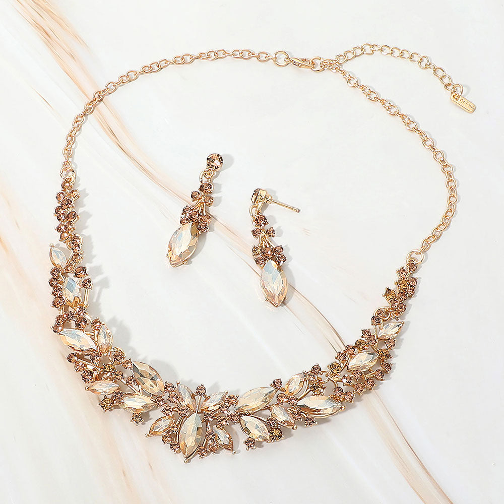Gold Stone-Light Topaz marquise stone cluster prom and evening necklace set on gold on white marble background