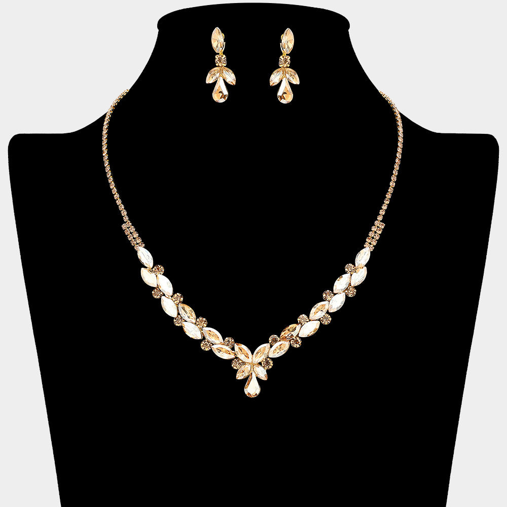 Light Topaz-Gold Stone marquise teardrop rhinestone cluster necklace set with matching earrings, all gold backed for prom and formal wear on a black mannequin bust. 