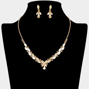 Light Topaz-Gold Stone marquise teardrop rhinestone cluster necklace set with matching earrings, all gold backed for prom and formal wear on a black mannequin bust. 