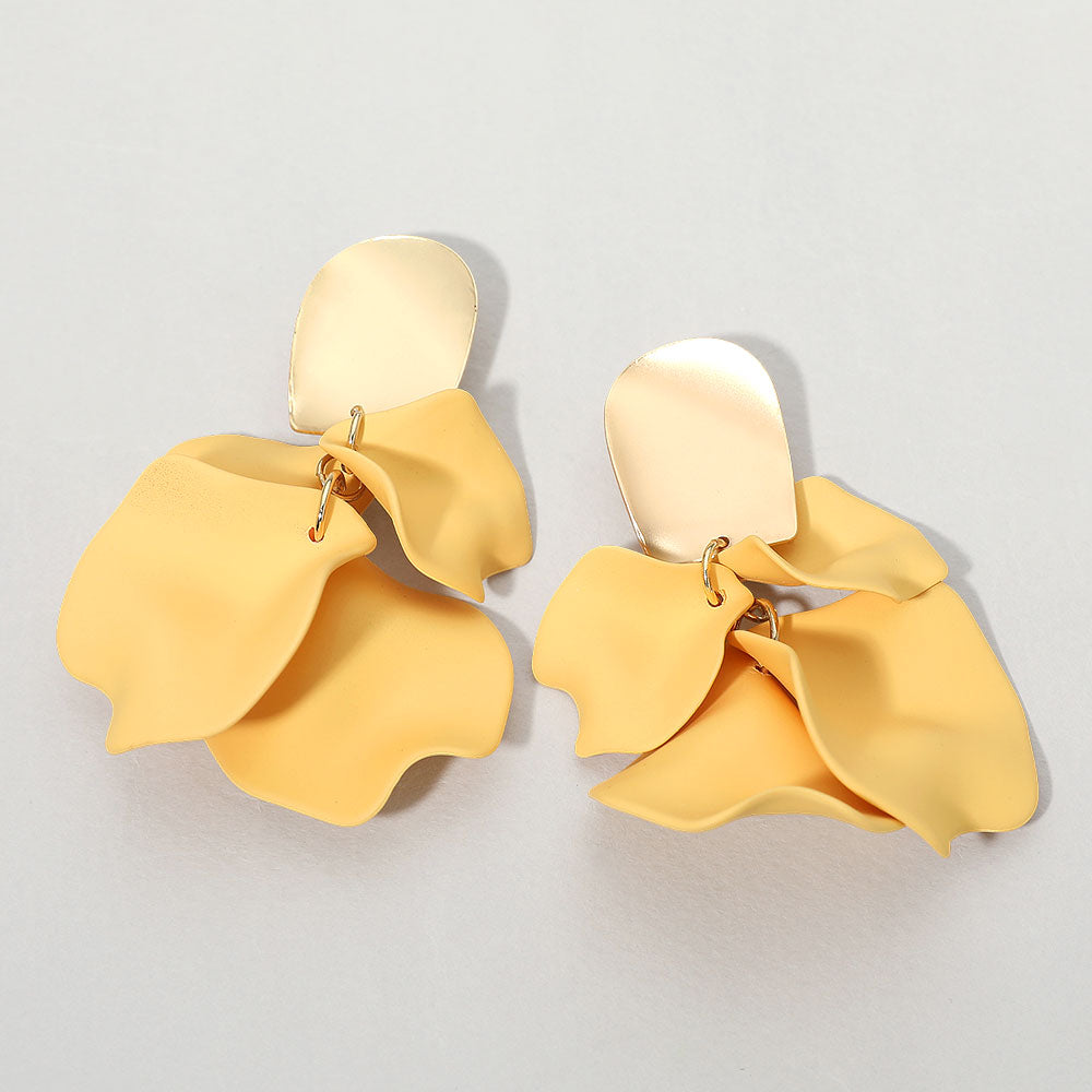 Light yellow layered petal cluster statement drop fun fashion earrings on gold on a white background