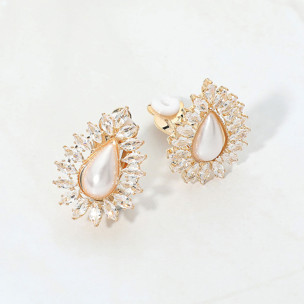 Marquise CZ teardrop cream pearl bridal formal clip-on earrings on gold on white background