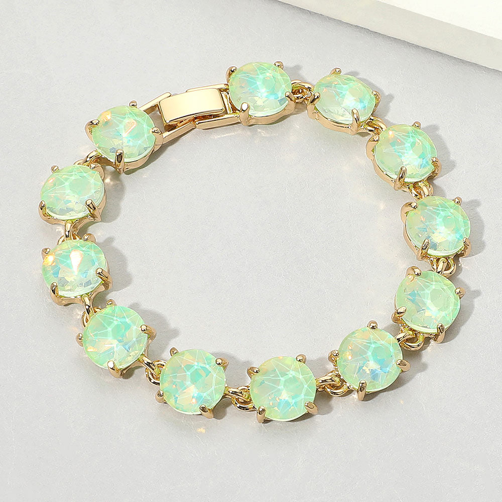 Mint Opal Round Stone Link Pageant Evening Bracelet on gold on a light grey background