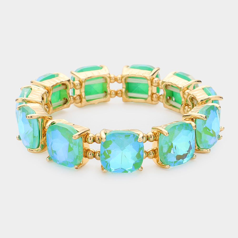 Mint AB cushion square stone stretch evening bracelet on gold on white background
