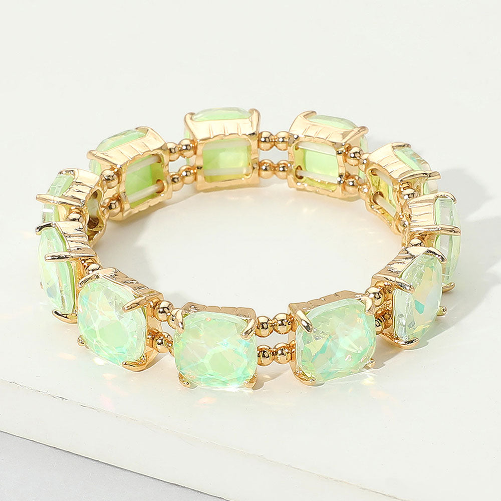 Mint opal cushion square stone stretch evening bracelet on gold, elegant statement bracelet for evening and special occasions on a white background