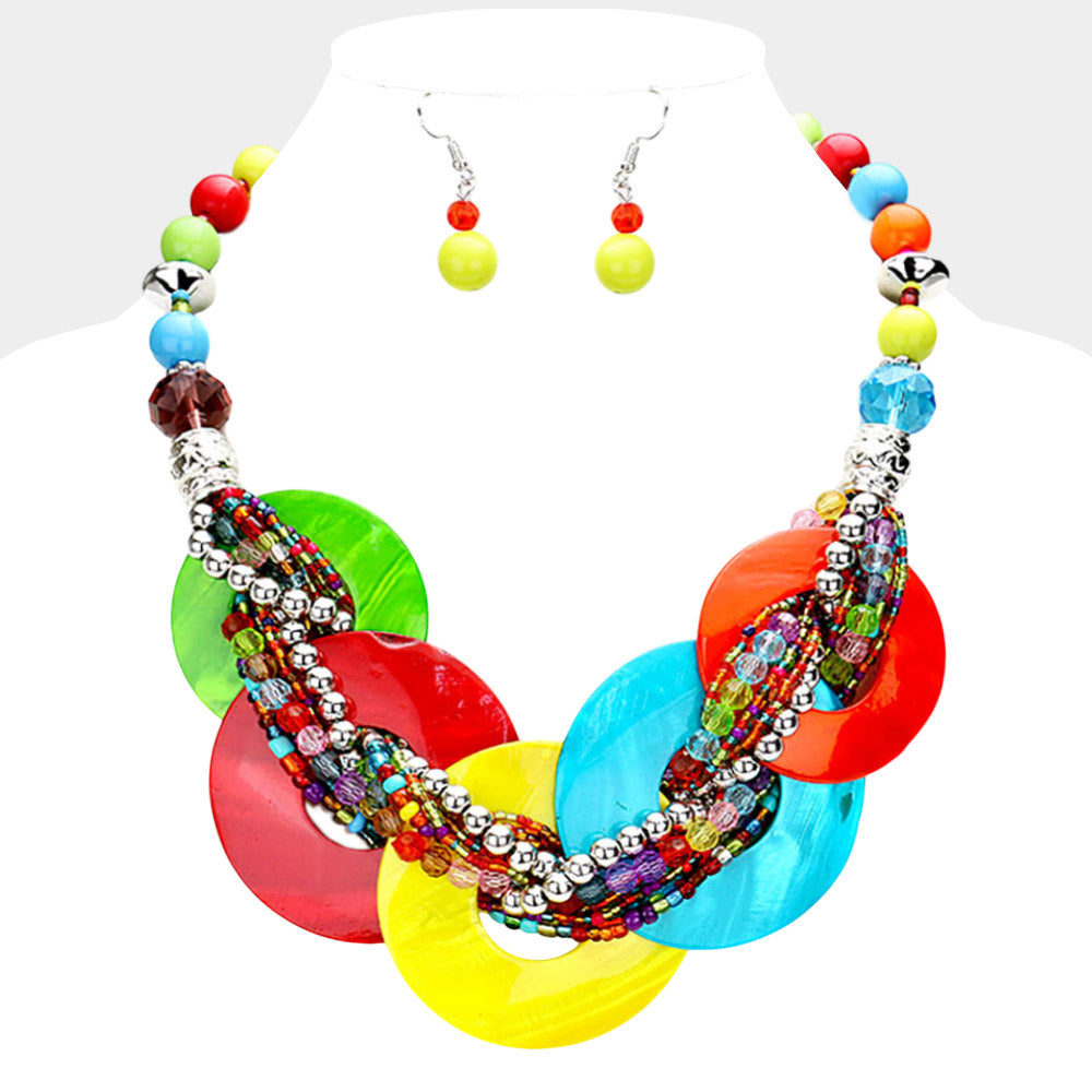 Multi-color chunky round link statement necklace set with matching earrings on white bust