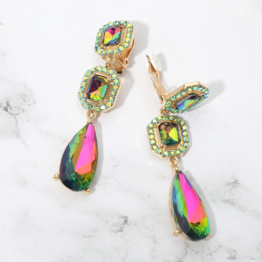 Multi-color crystal square and teardrop clip-on earrings on gold-tone metal, displayed against a white background.