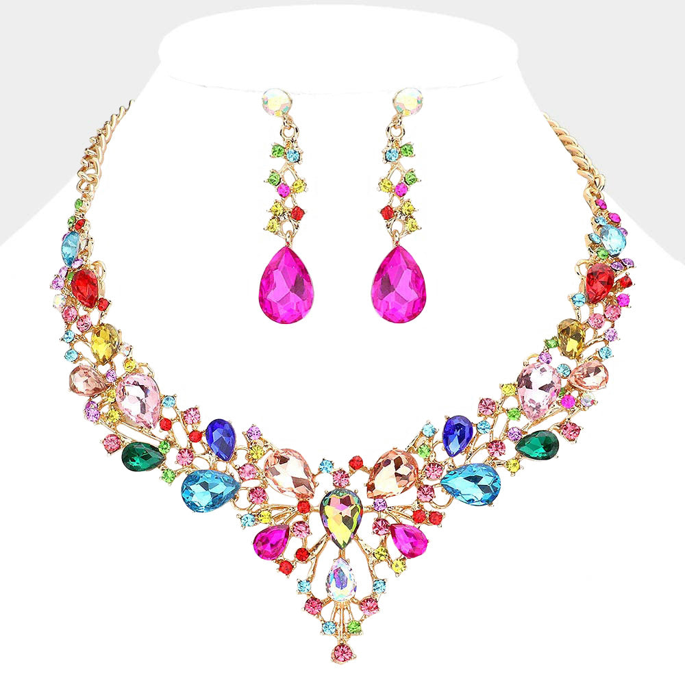 Multi-color teardrop and round stone statement necklace set with matching drop earrings on gold on white background