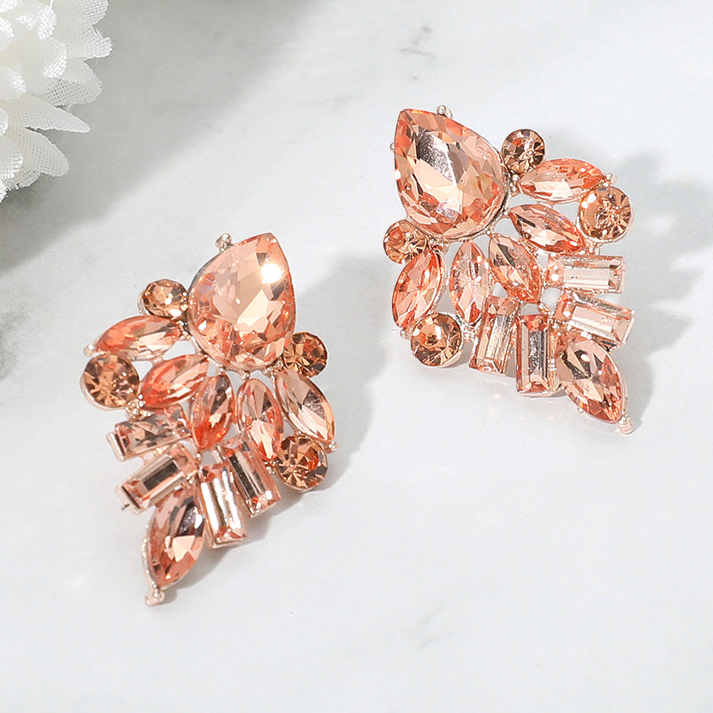 Multi stone peach crystal evening earrings on rose gold on white background