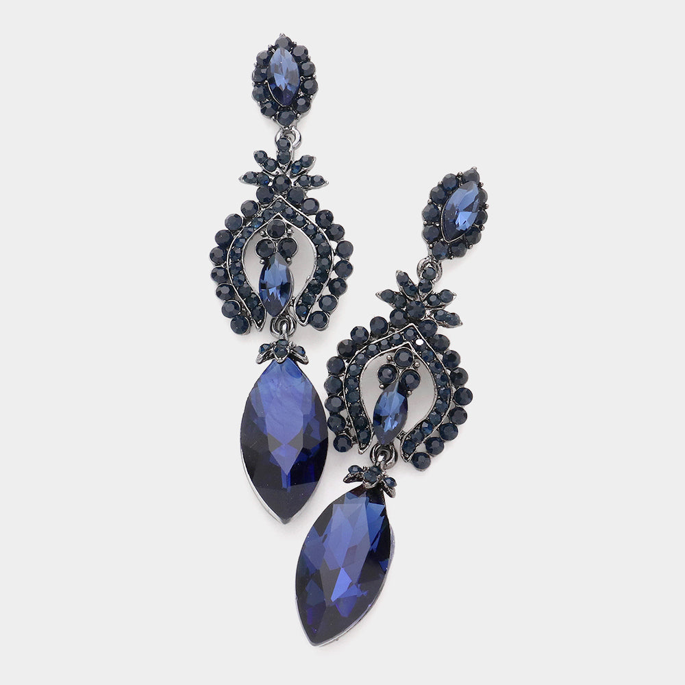 Pair of navy blue teardrop earrings with intricate designs on a white background