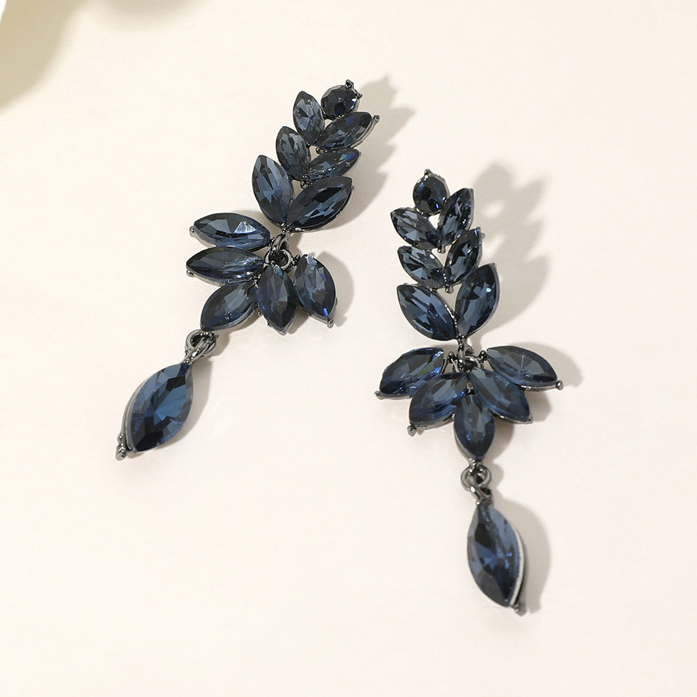 Navy marquise stone cluster leaf drop earrings on black with elegant dangling accent, 2.5 inch statement earrings on a light beige background