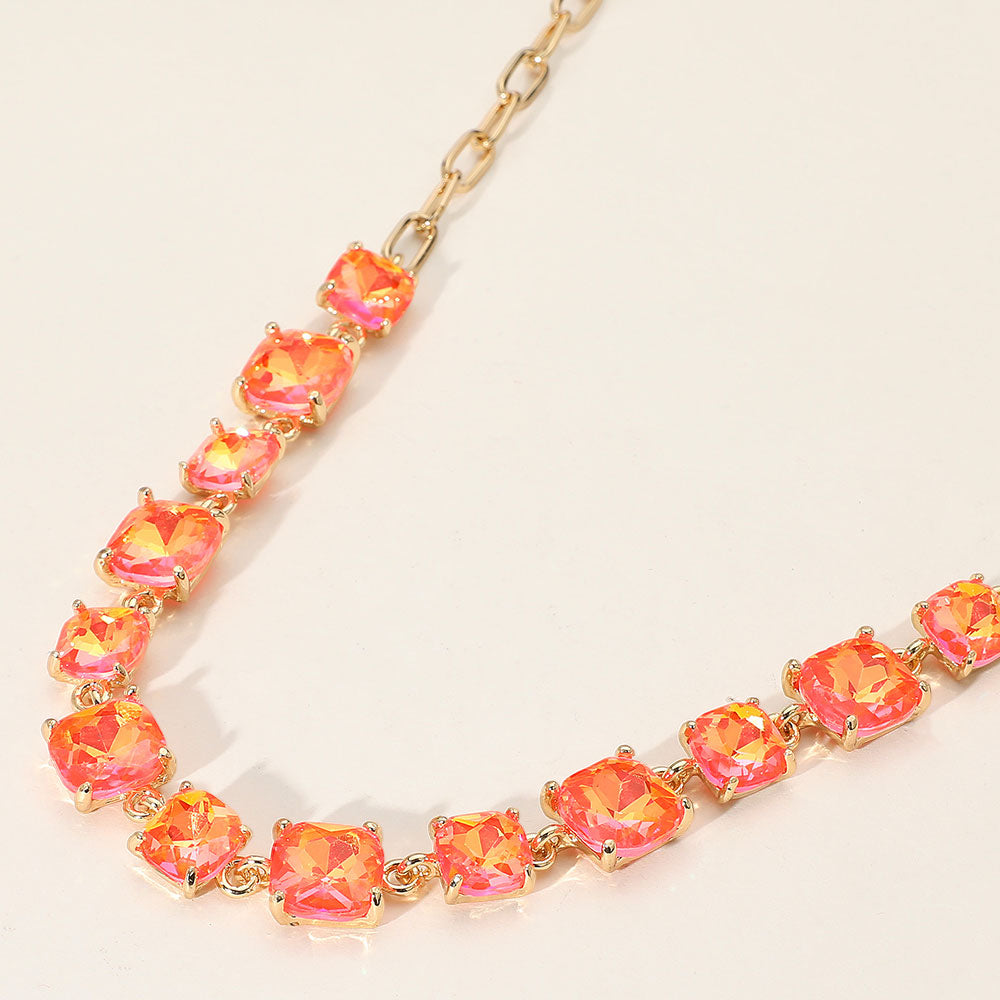 Necklace with square neon coral gemstones on a white background