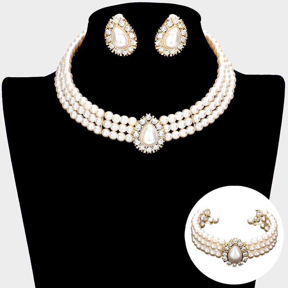 Cream Pearl 3-Row Choker Bridal Necklace Set with clip on earrings and matching bracelet with a large teardrop cream pearl as a center decor on a black mannequin bust