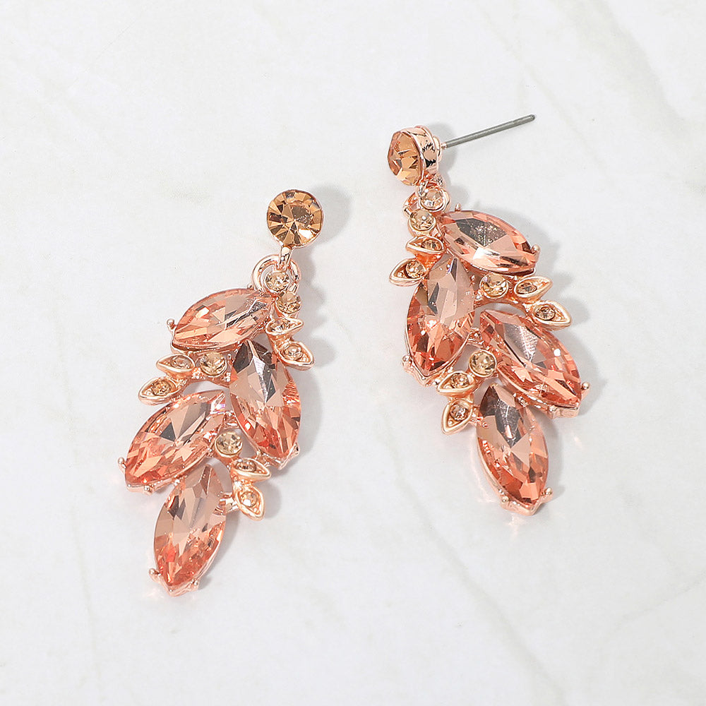 Peach marquise stone cluster leaf drop earrings on rose gold on white background