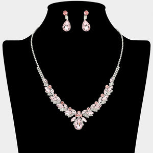 Pink teardrop marquise prom necklace set on silver with matching earrings displayed on a black mannequin bust on a white background.