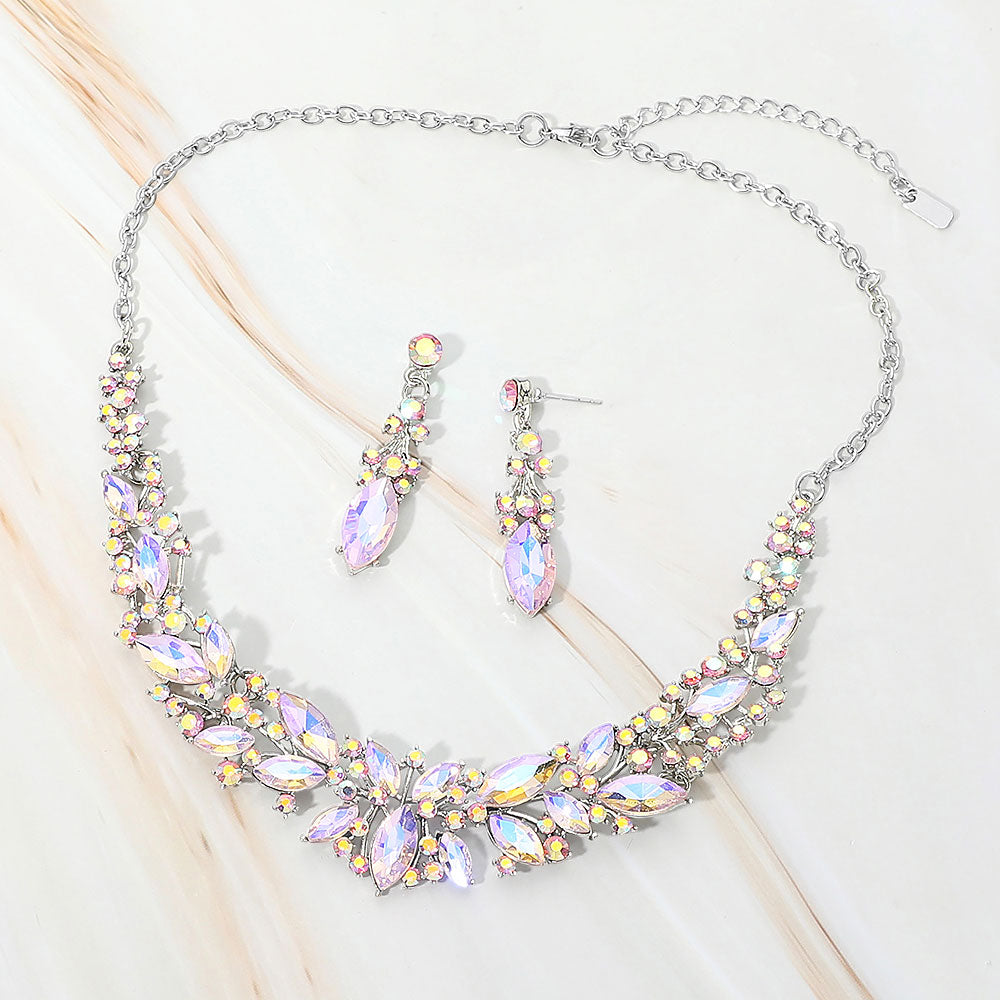 Pink AB marquise stone cluster prom and evening necklace set on silver on white marble background