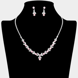 Pink and clear crystal delicate necklace set on silver with alternating marquise stones, a small center drop, and matching drop earrings, displayed on a black jewelry bust.