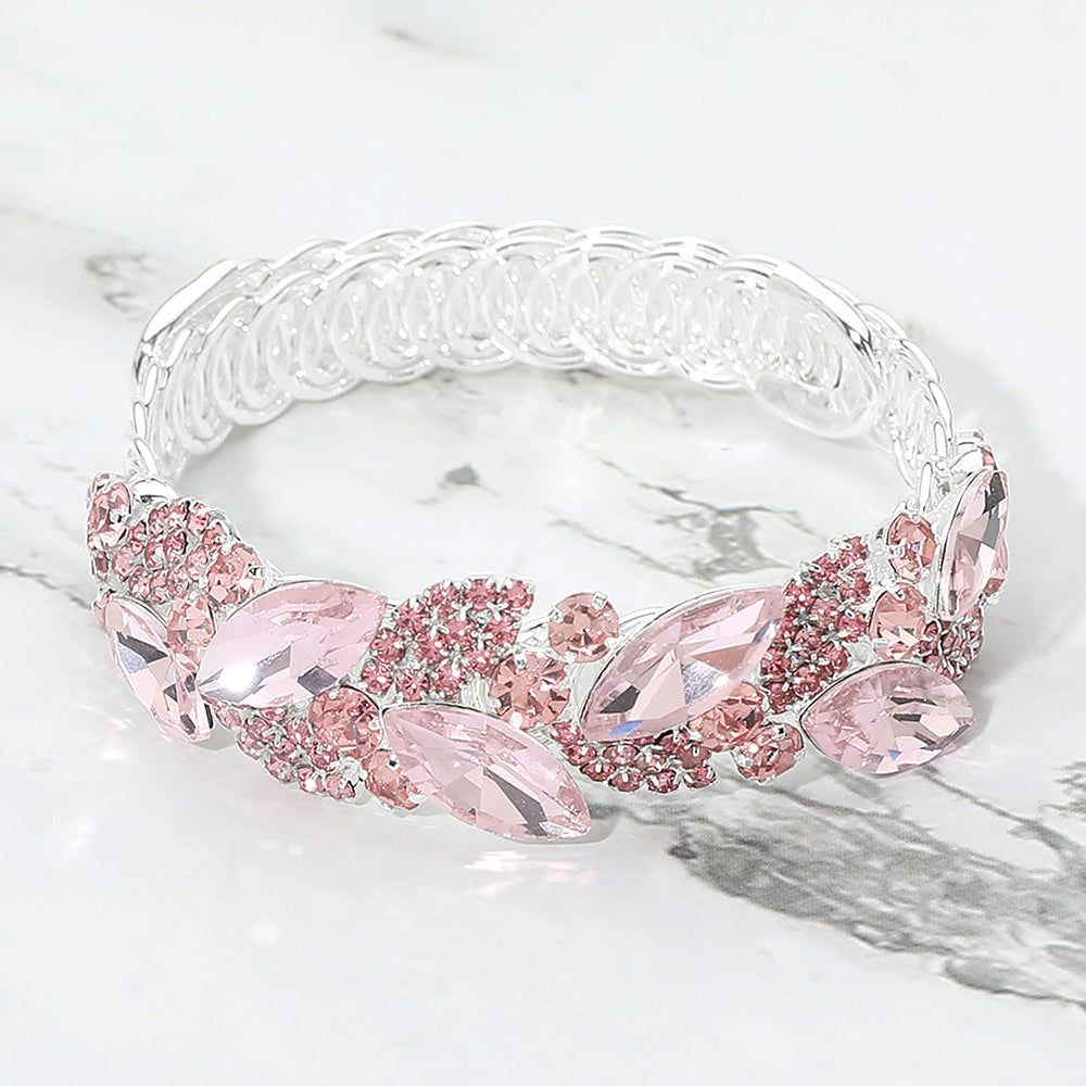 Pink marquise stone cluster adjustable bracelet on silver on marble surface