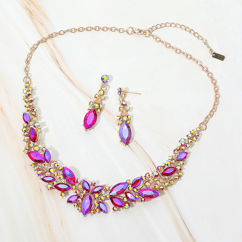 Purple AB marquise stone cluster prom and evening necklace set on gold on white marble background
