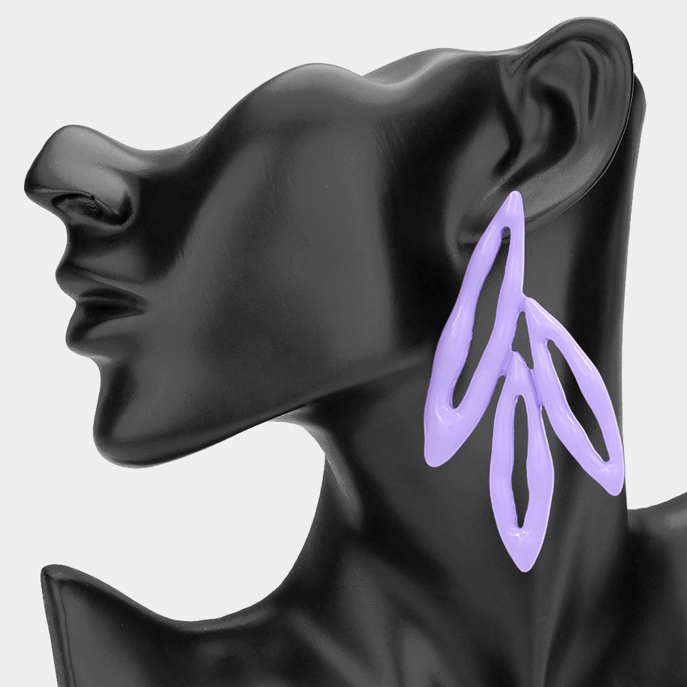 Purple abstract geometric fun fashion statement drop earrings displayed on a black mannequin