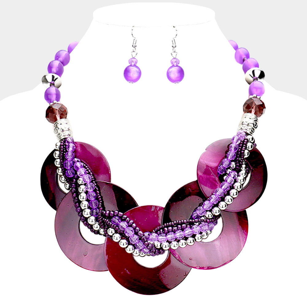 Purple chunky round link statement necklace set with matching earrings on white bust
