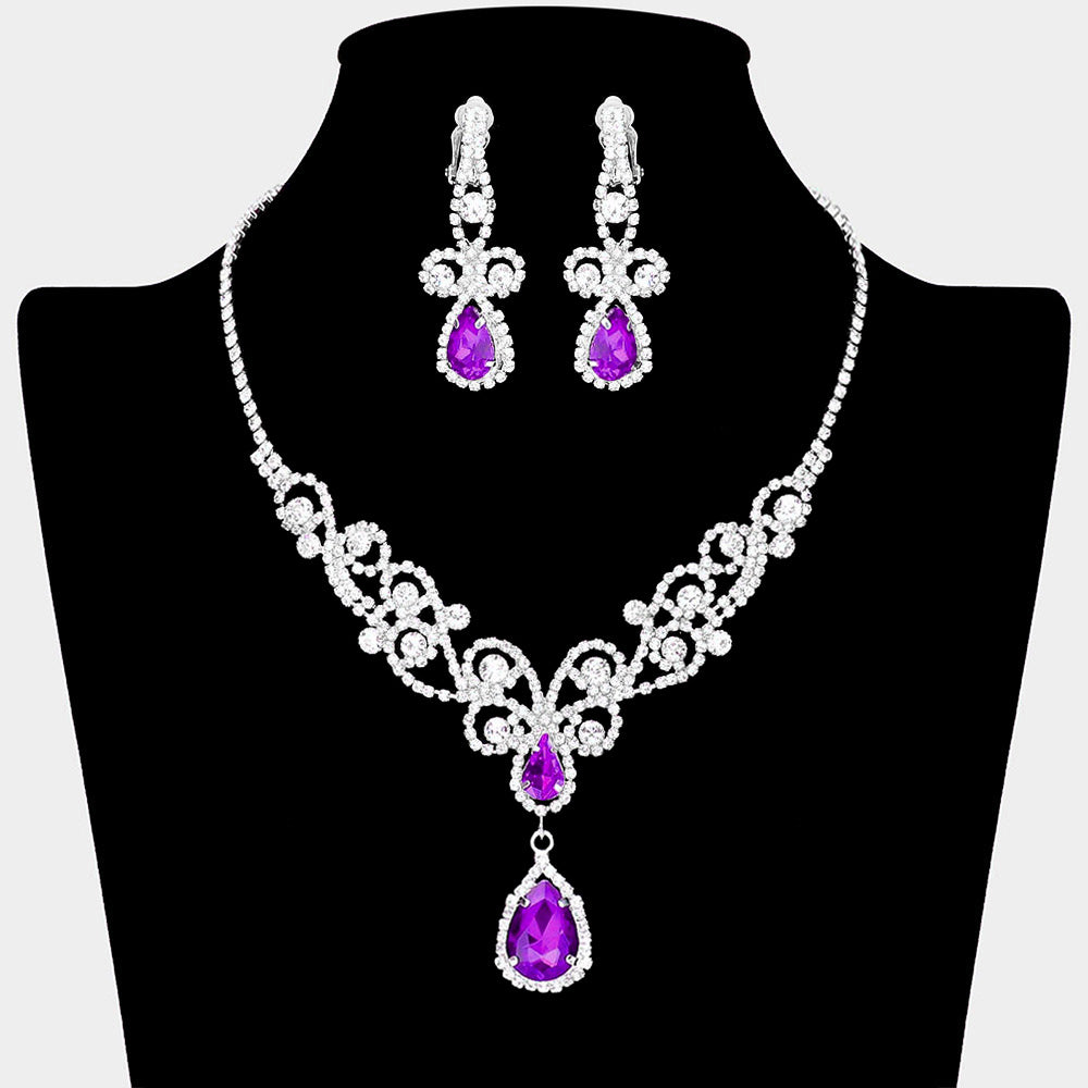 Purple teardrop crystal rhinestone vine necklace set with clip-on earrings on black bust