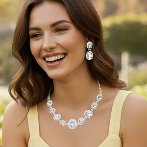 Woman wearing a Pave Trim Clear Stone Rhinestone Necklace and Earrings, silver backed, outdoors