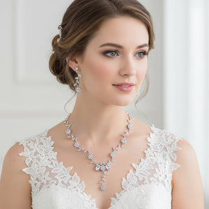 Crystal Floral Vine Prom Necklace Set | Evening Necklace Set, silver backed, on a Woman wearing a white lace wedding dress on a plain background