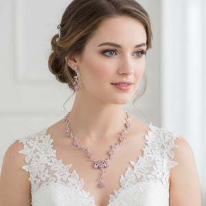 Model wearing an pink crystal floral vine necklace set on silver styled for prom and evening wear.