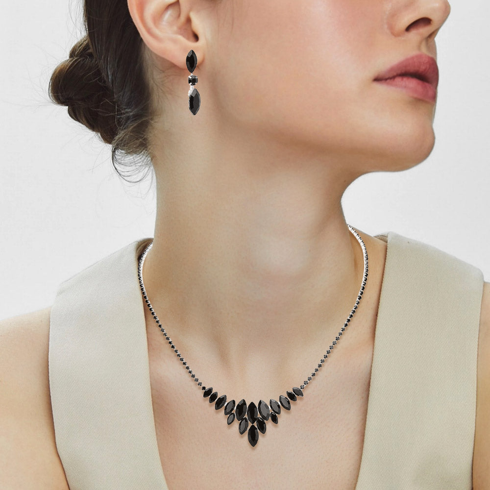 Black Crystal Cluster Statement Necklace with matching earrings – Sparkling Rhinestone Embellished Jewelry. Shown here on a lady's neck.