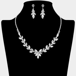 Clear marquise floral rhinestone necklace set on silver displayed on black bust background