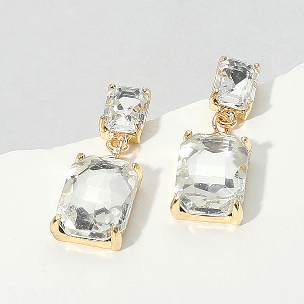 Rectangular Clear Dangle Earrings on Gold on a white background