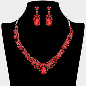 Red crystal teardrop leaf necklace and earring set styled for prom or evening wear, shown on a black mannequin bust on a white background