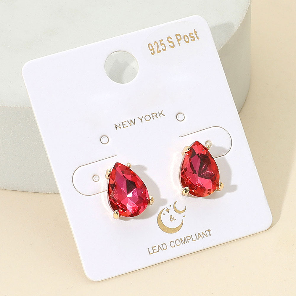 Red teardrop earrings on a '925 S Post New York' branded card.