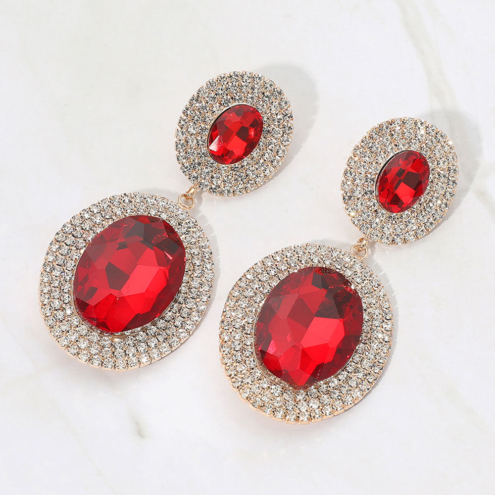 Red crystal double oval halos surrounded by rhinestones on gold on a white background — elegant 2.8" statement jewelry for weddings, prom, and evening glam.