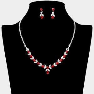 Red and clear crystal delicate necklace set on silver with alternating marquise stones, a small center drop, and matching drop earrings, displayed on a black jewelry bust.