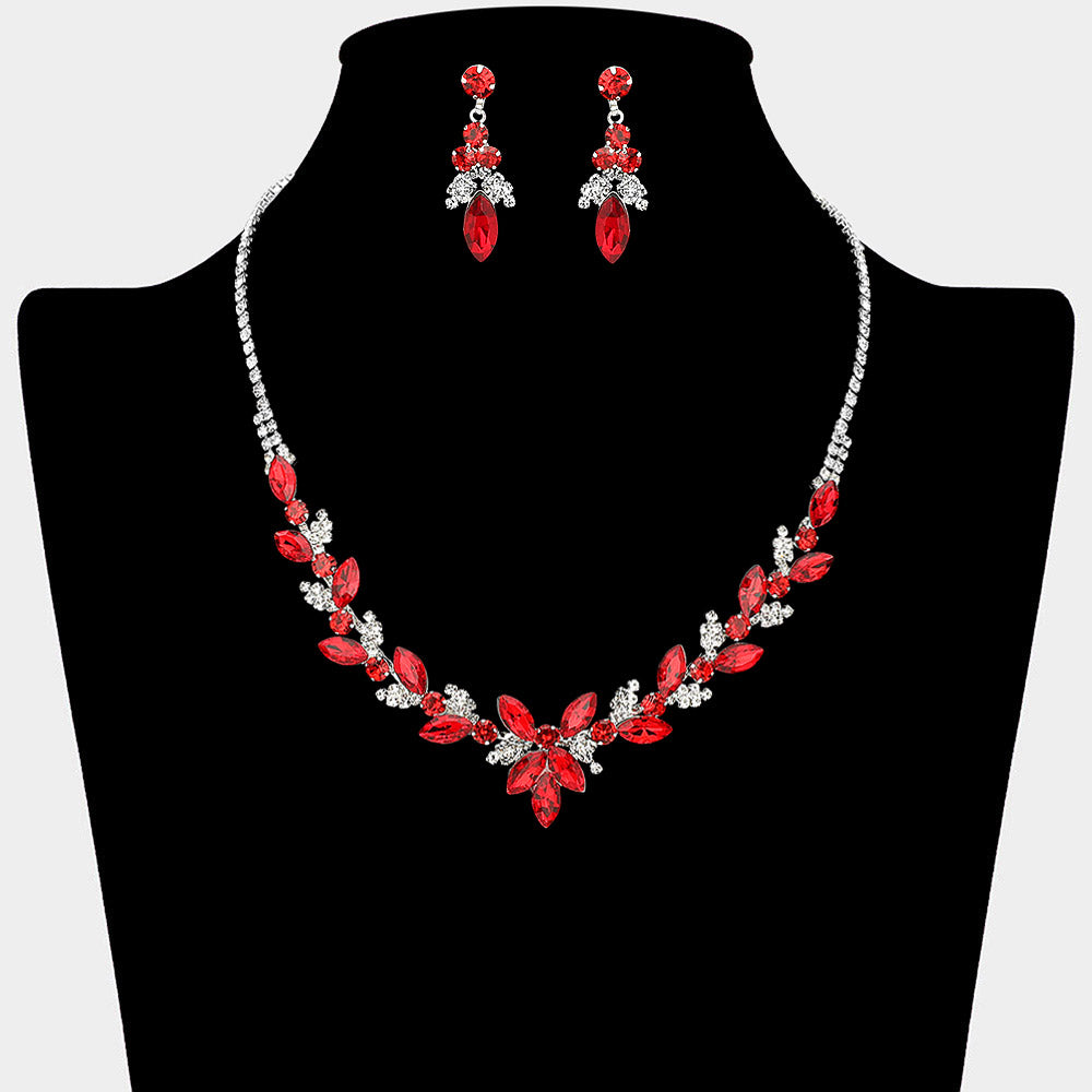 Red marquise floral rhinestone necklace set on silver displayed on black bust background