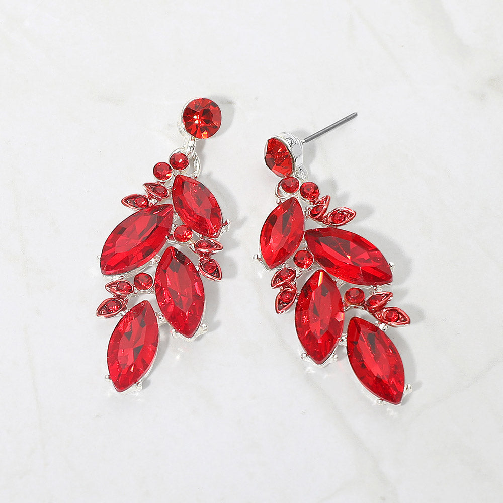 Red marquise stone cluster leaf drop earrings on silver on white background