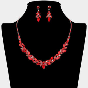 Red marquise leaf rhinestone necklace set on silver displayed on black bust background