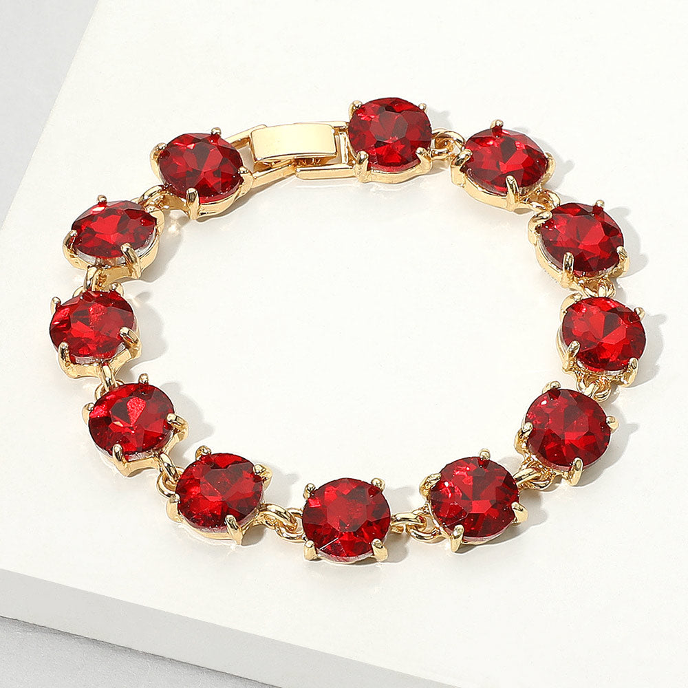 Red Round Stone Link Pageant Evening Bracelet on gold on a light white background