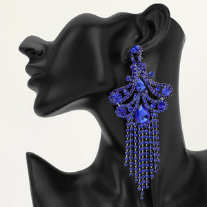 A large ornate Sapphire Royal Blue crystal statement earring with cascading bead fringe and clear crystal accents on a black earring mannequin.