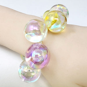 Chunky royal blue iridescent balls/spheres bracelet on a wrist