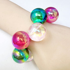 Chunky mult-color iridescent balls/spheres bracelet on a real person's wrist