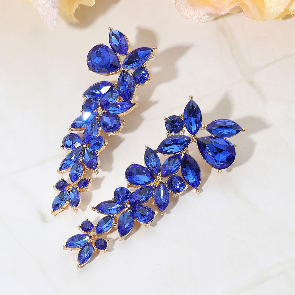 Sapphire Royal Blue floral multi stone drop earrings on gold with layered crystal cluster design, 3 inch statement earrings on a white background