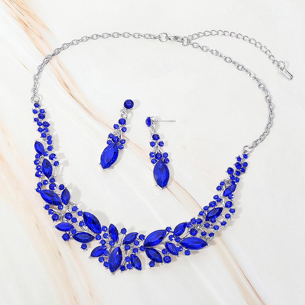 Sapphire-Royal Blue marquise stone cluster prom and evening necklace set on silver on white marble background